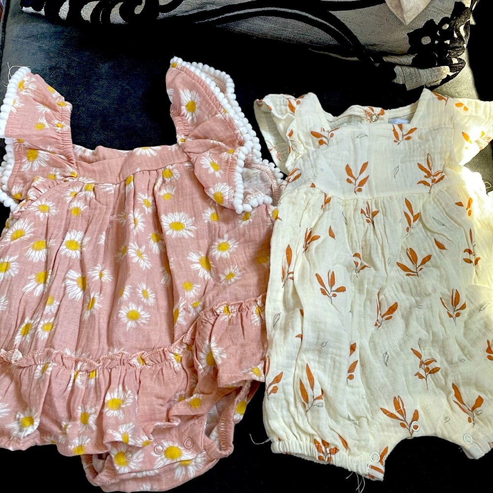 Pink baby onesies by Rachel Zoe